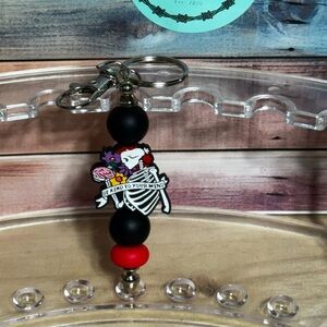 Black and Red Beaded Keychain with Skeleton Design